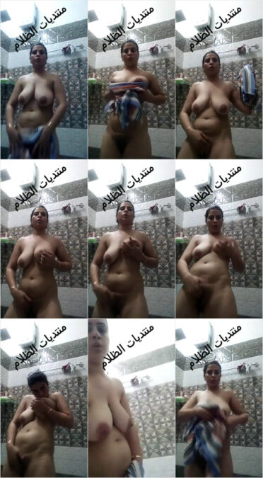ميلف عربيه هايجه بعد لما تاخد الدوش بتاعها وتنشف جسمها تدعك كسها لعشيقها من الحمام
